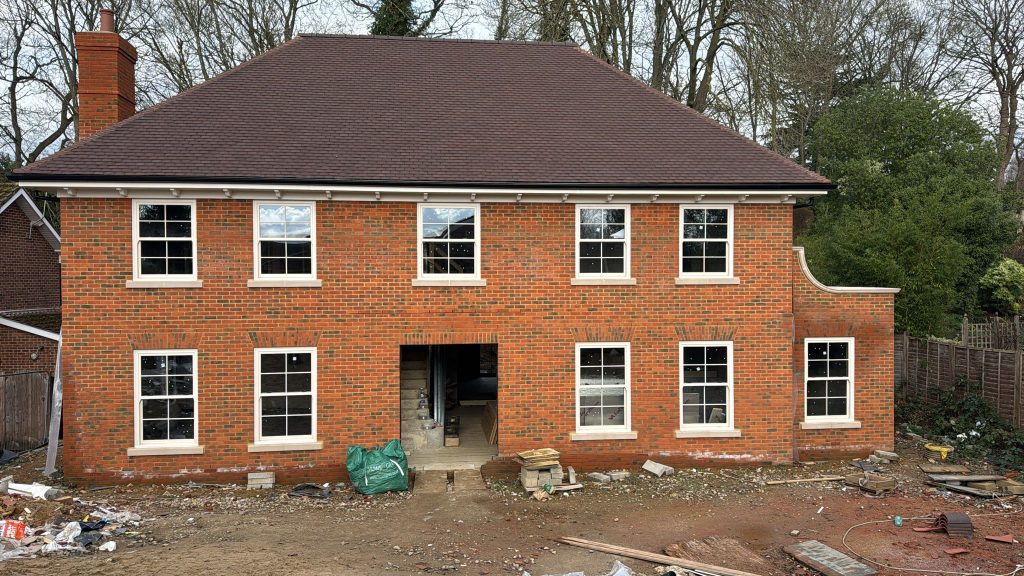 Installation of vertical sliding uPVC windows and doors in a house in St Albans