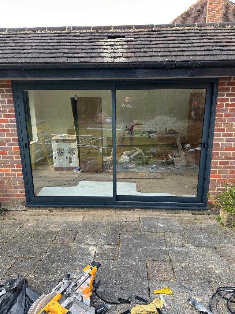 Lift-and-slide patio door or standard sliding patio door installaation in a house in Barnet